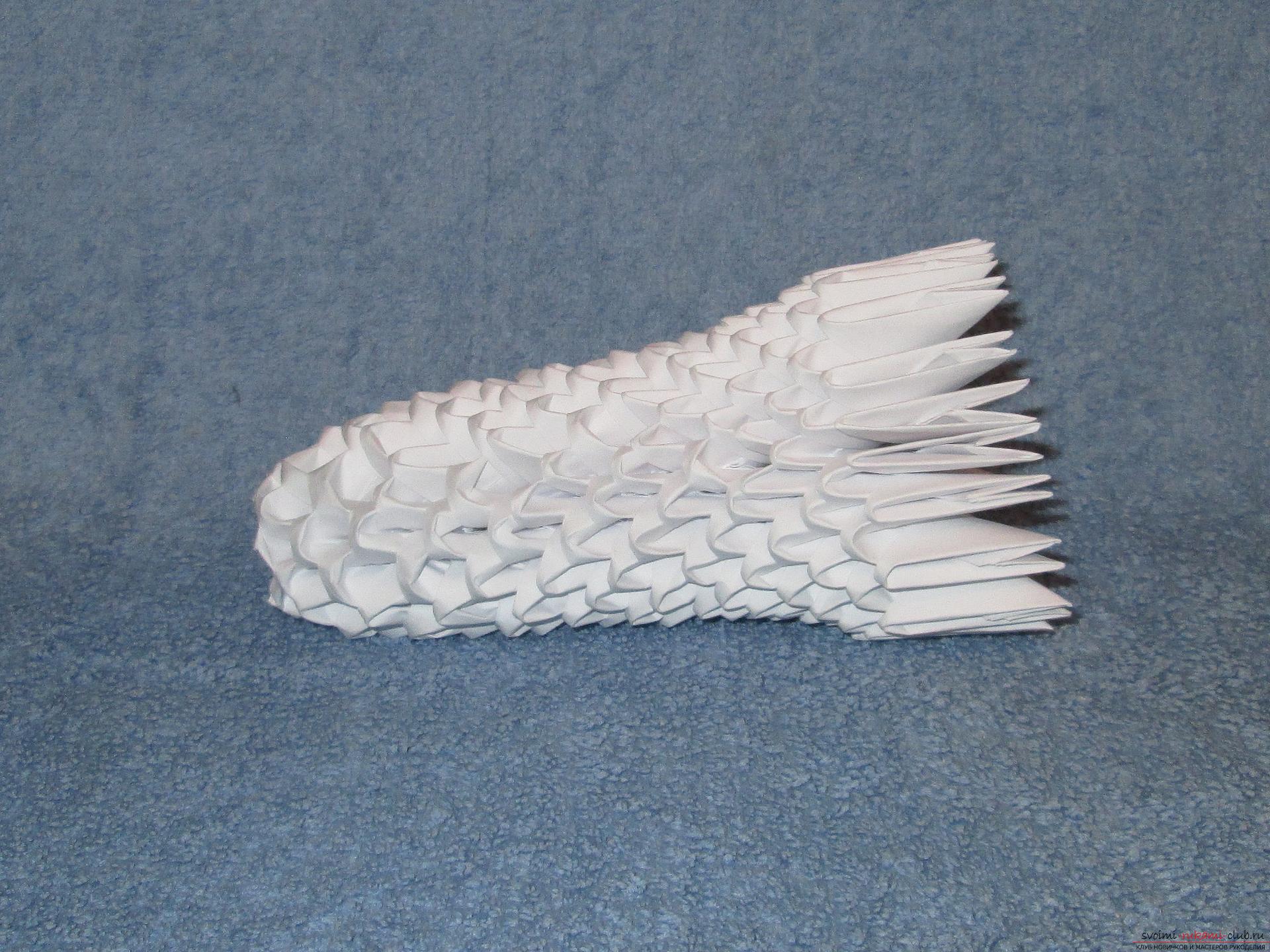 Если вы любите собирать модульное оригами, этот мастер-класс по созданию дельфина из бумаги для вас.. Фото №13